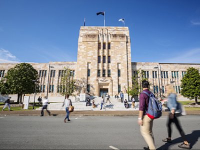 Students walking through a university campus 